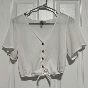 Sheer off white shirt sleeve button up top with tie front